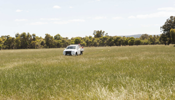 Farm vehicle in field