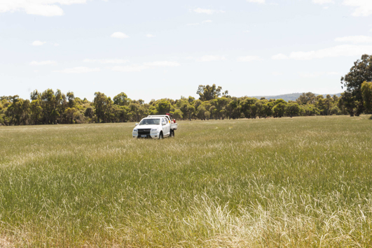 Farm vehicle in field