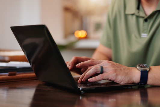 Person typing on a laptop