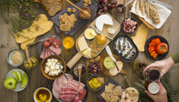 Overhead view of a large group of local food and beverage produce