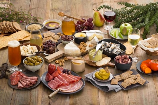 Overhead view of a large group of local food and beverage produce