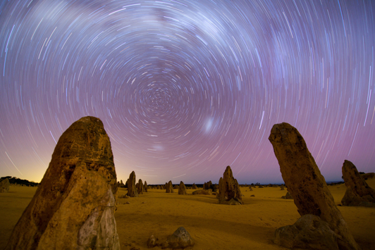 Long exposure image of the Pinnacles with the night sky and stars moving
