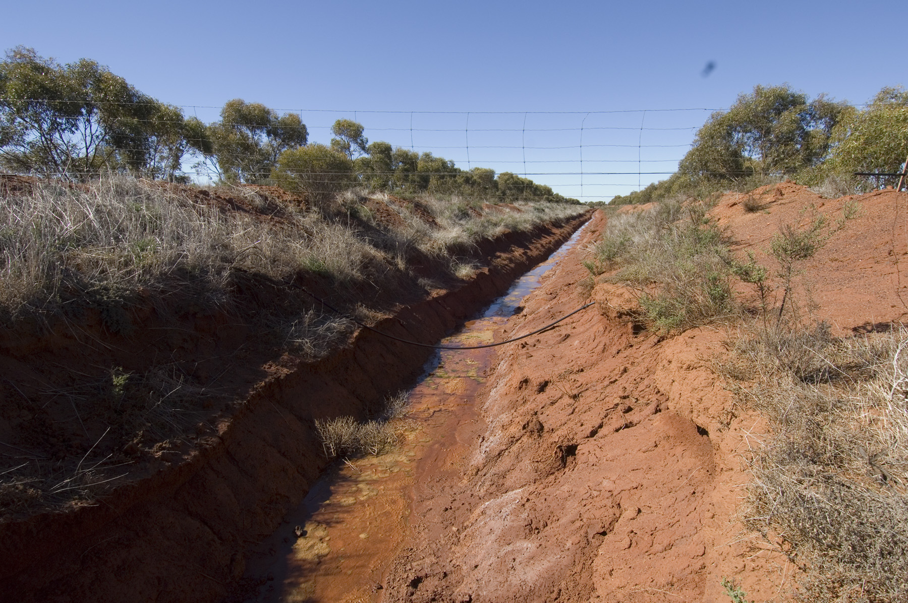 Drain in red dirt